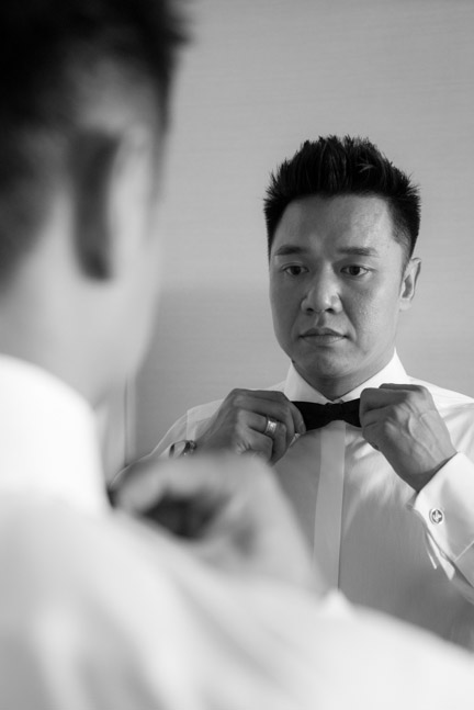 groom adjust bow tie